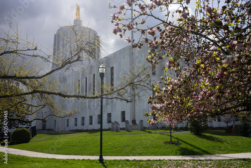 The Oregon State Capitol building against dramatic clouds on a beautiful spring day. photo