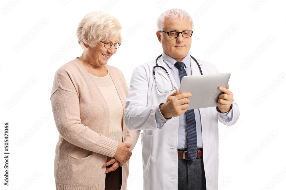 Male doctor and an elderly woman patient looking at a digital tablet Male doctor and an elderly woman patient looking at a digital tablet