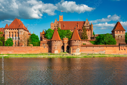 The Castle of the Teutonic Order in Malbork by the Nogat river. Poland