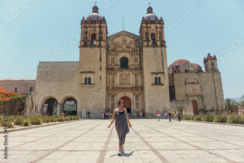 tourist woman walking in oaxaca city mexico photo