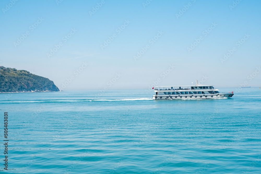 a ferry shipping away from an island near to istanbul a ferry shipping away from an island near to istanbul