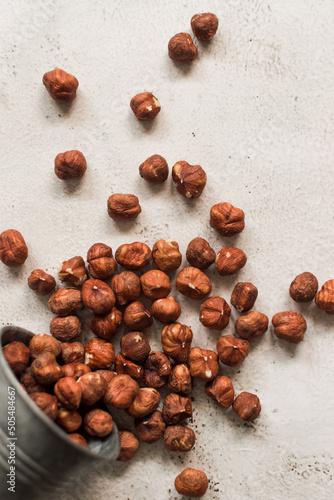 pile of raw hazelnut on white background