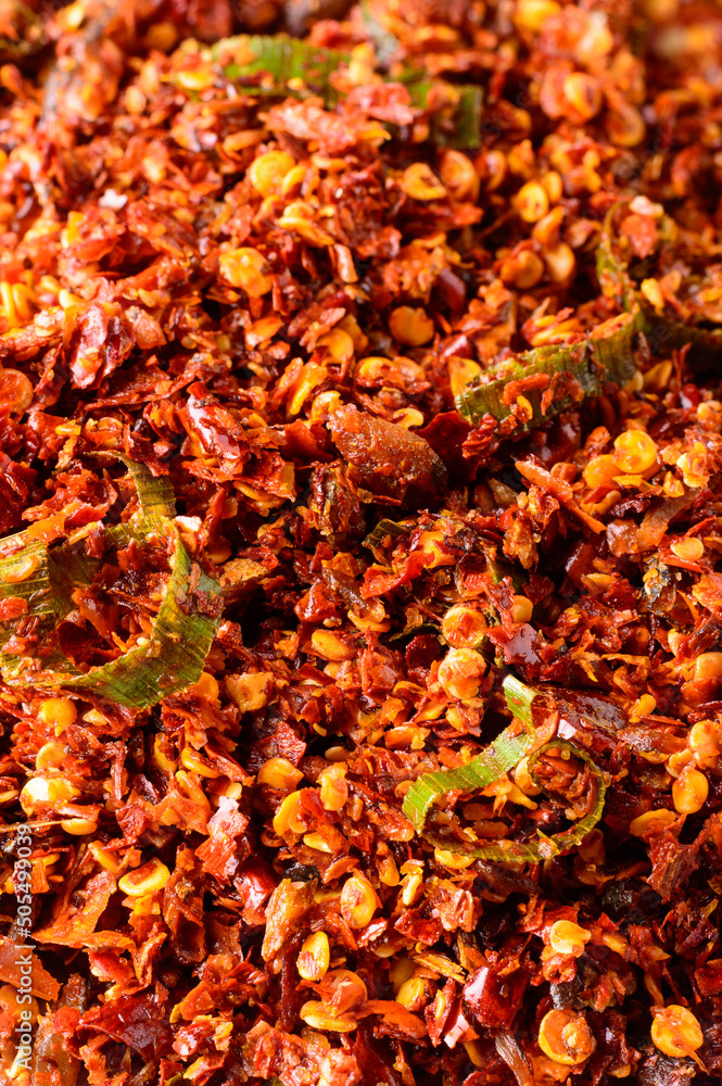 red chili sambol or spicy condiment, made with chili peppers and maldive fish, taken in shallow depth of field red chili sambol or spicy condiment, made with chili peppers and maldive fish, taken in shallow depth of field