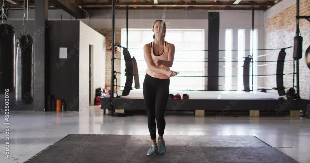Video of fit caucasian woman jumping on jumping rope at gym Video of fit caucasian woman jumping on jumping rope at gym