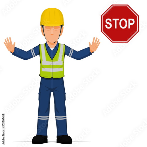 An industrial worker is raise hand to stop