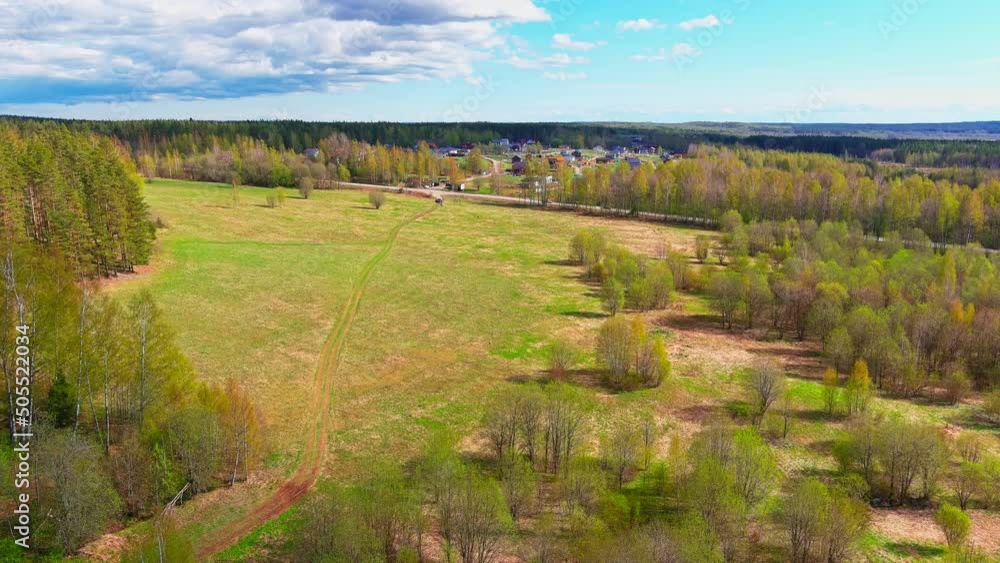aerial view of fields with forests on a spring sunny day, a magical landscape with treetops, lakes in the background aerial view of fields with forests on a spring sunny day, a magical landscape with treetops, lakes in the background