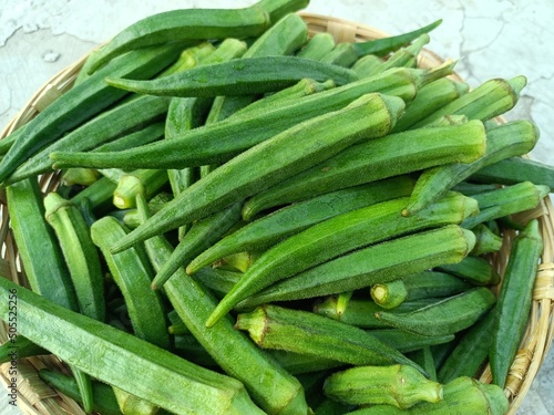Okra or ladies fingers or bhindi or lady finger in basket green vegetables in basket