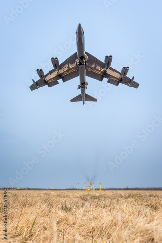 Low pass B-52 airplane