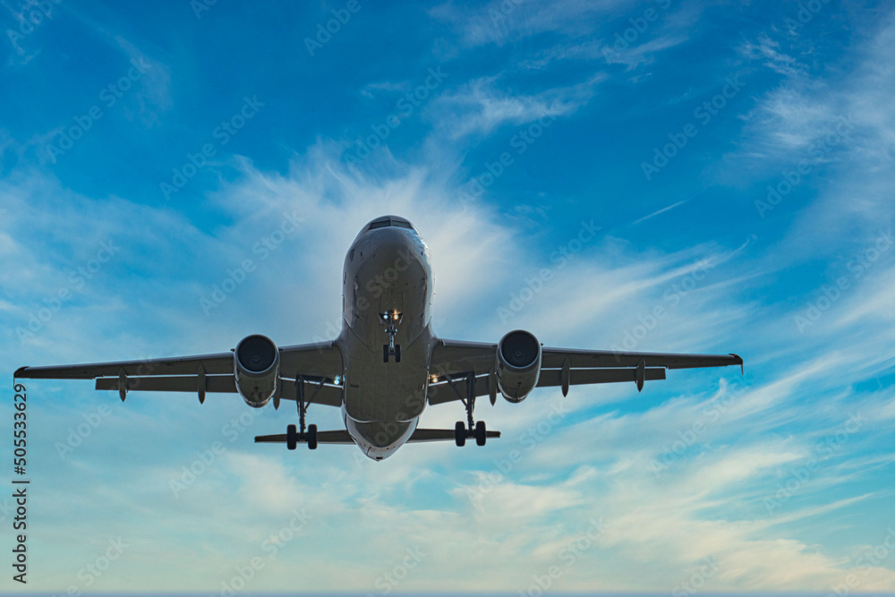 Fotografie large passenger plane on approach for landing