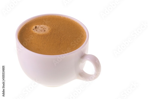 Close up view of aromatic black coffee poured into white mug isolated on white background. Sweden.