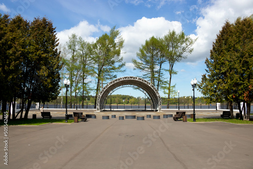 Summer stage in the park for events. Metal construction with a canopy.