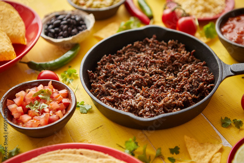 Wallpaper Mural Various fresh and tasty ingredients for chilli con carne. With meat on iron pan Torontodigital.ca