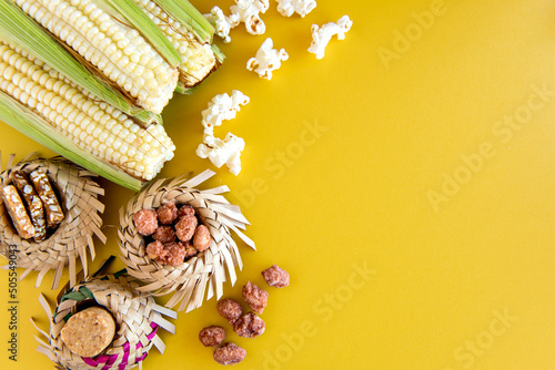 Sweet Table in June Party, Brazilian Sao Joao celebration on yellow background. photo