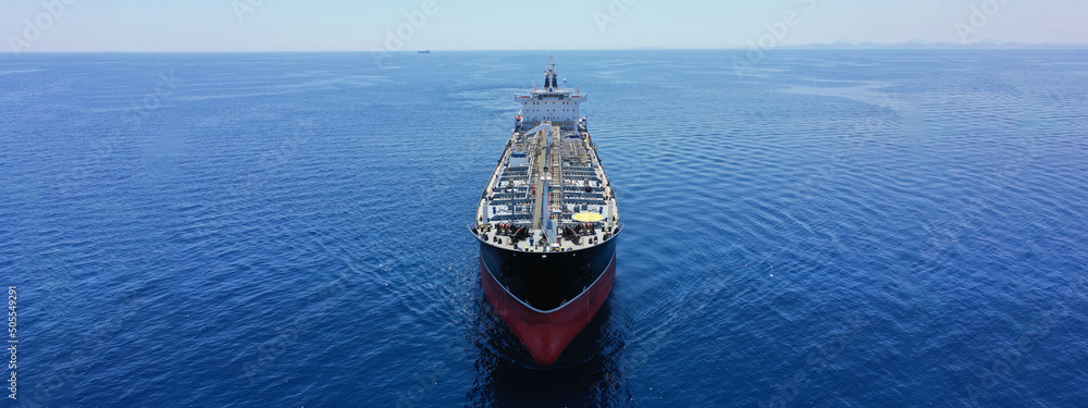 Aerial drone ultra wide photo of latest technology in safety standards crude oil tanker cruising Aegean deep blue sea, Greece