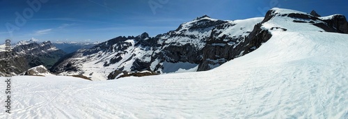 Ski tour below mount clairden. High-altitude ski tour in the Swiss mountains. High quality photo. Panorama picture