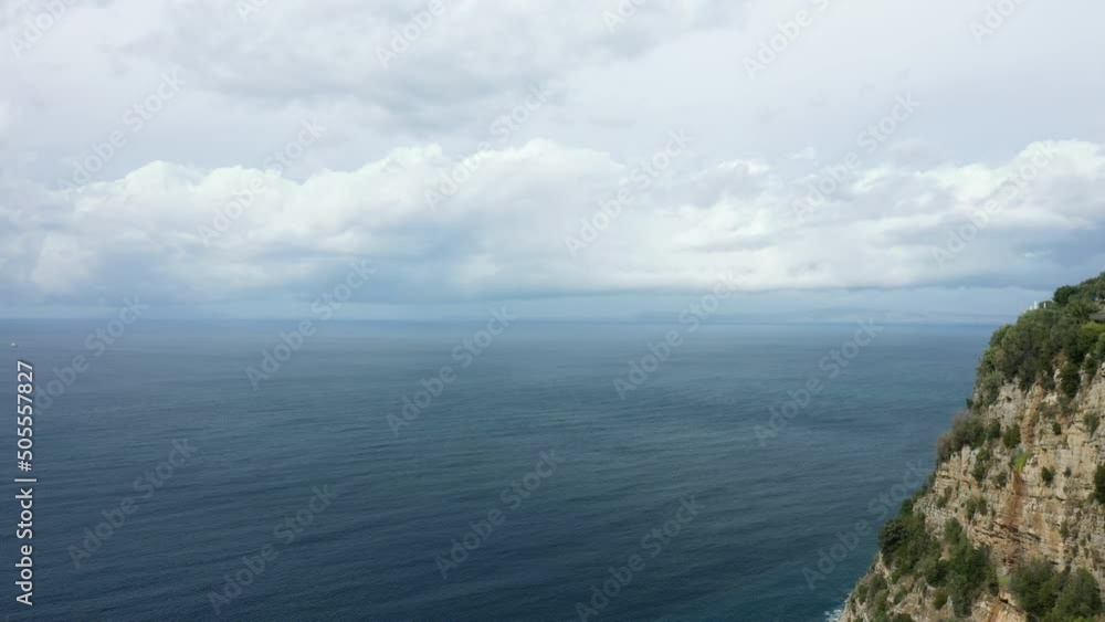 Mount Vesuvius towards Amalfi in Europe, Italy, Campania, in summer, on a cloudy day. Mount Vesuvius towards Amalfi in Europe, Italy, Campania, in summer, on a cloudy day.