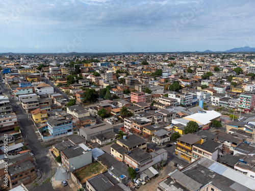 Slum favela-style community city on the outskirts of Vitoria  Cariacica  Espirito Santo - aerial drone view