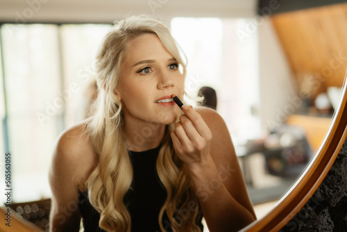 Woman apply makeup