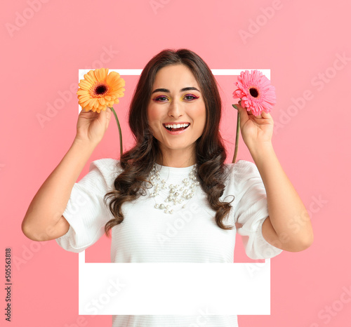 Happy young woman with gerb...