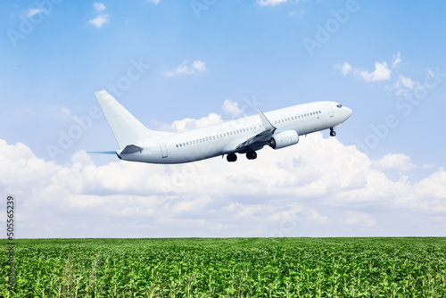 View of flying airplane in blue sky