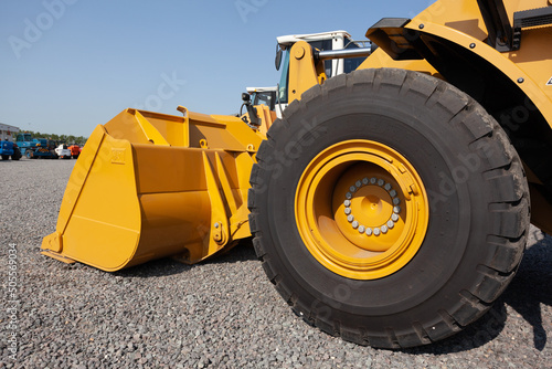Blade and front wheel of a bulldozer