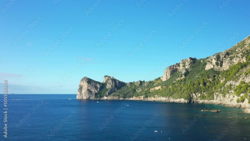 The countryside around Marina del Cantone on the Tyrrhenian Sea in Europe, Italy, Campania, in summer on a sunny day. The countryside around Marina del Cantone on the Tyrrhenian Sea in Europe, Italy, Campania, in summer on a sunny day.