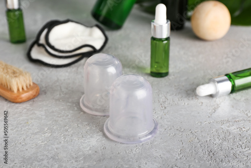 Vacuum jars for anti-cellulite massage on table