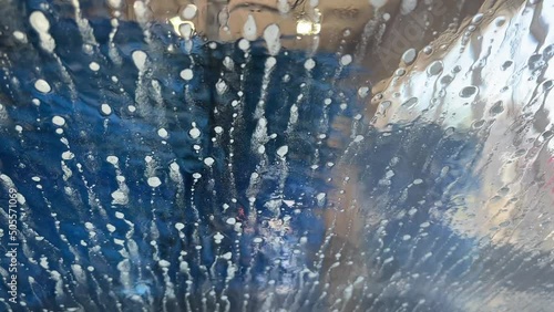 Automatic Car Wash POV Inside the Car Window With Foam photo