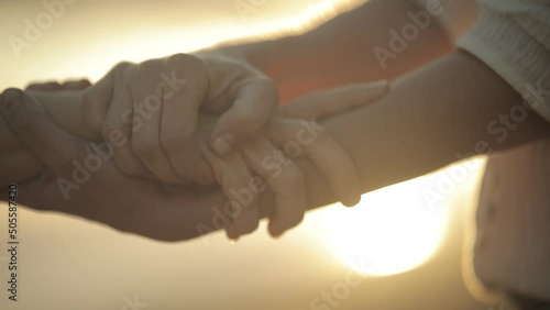 friends holding hands empathy compassion comforting hand love slow motion photo