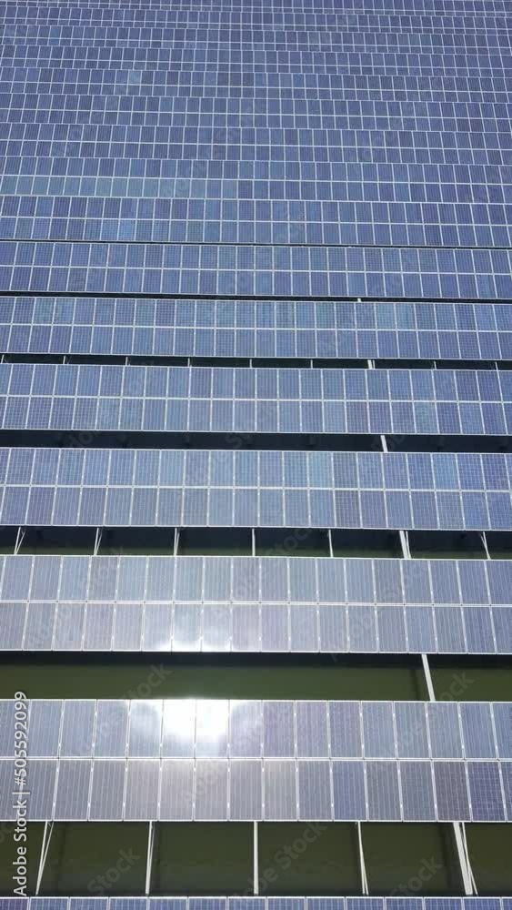aerial view of solar power panels over water
aerial view of solar power panels over water