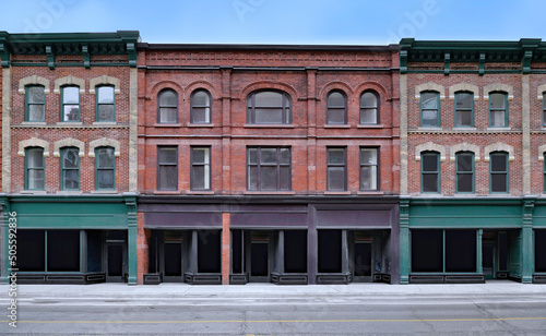 Old fashioned main street buildings with stores at ground level and apartments or offices above