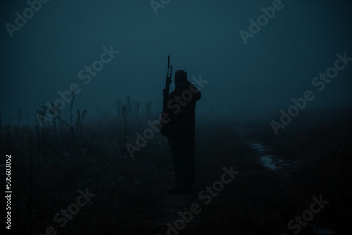 silhouette of a person in the fog