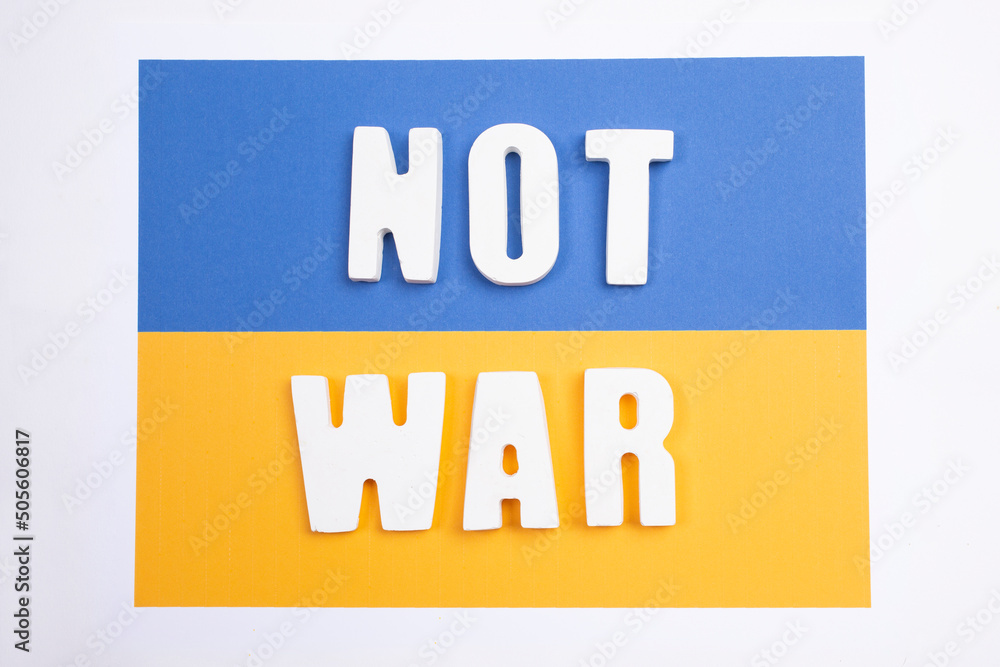 Phrase Stop the war written with white letters on colors of the Ukrainian flag. Peace concept. Stop the war Phrase Stop the war written with white letters on colors of the Ukrainian flag. Peace concept. Stop the war