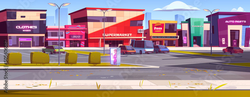 City street with commercial buildings, shops and car parking. Vector cartoon autumn cityscape with supermarket, cafe, library, pharmacy, store with clothes and auto parts