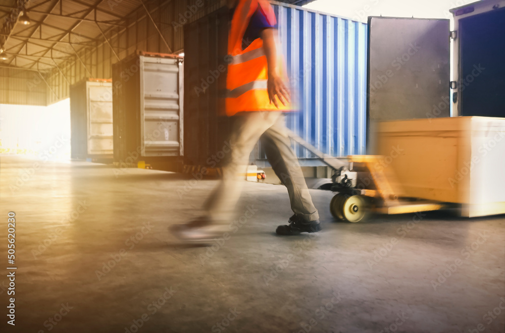 Motion Blur of Workers Unloading Cargo Pallets to The Cargo Container Trucks. Loading Dock. Shipping Warehouse. Delivery. Shipment Goods. Supply Chain. Warehouse Logistics Cargo Transport.	
 - obrazy, fototapety, plakaty 