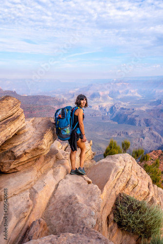A woman on a viewpoint of the descent of the South Kaibab Trailhead. Grand Canyon