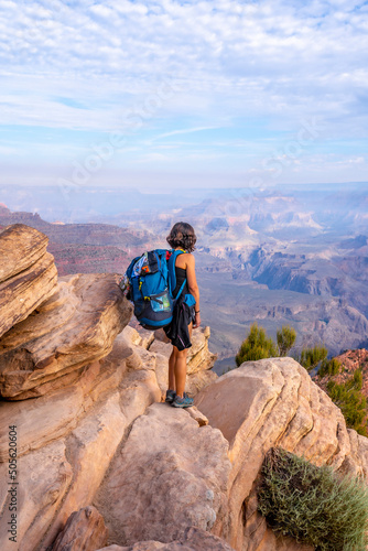 A woman on a viewpoint of the descent of the South Kaibab Trailhead. Grand Canyon