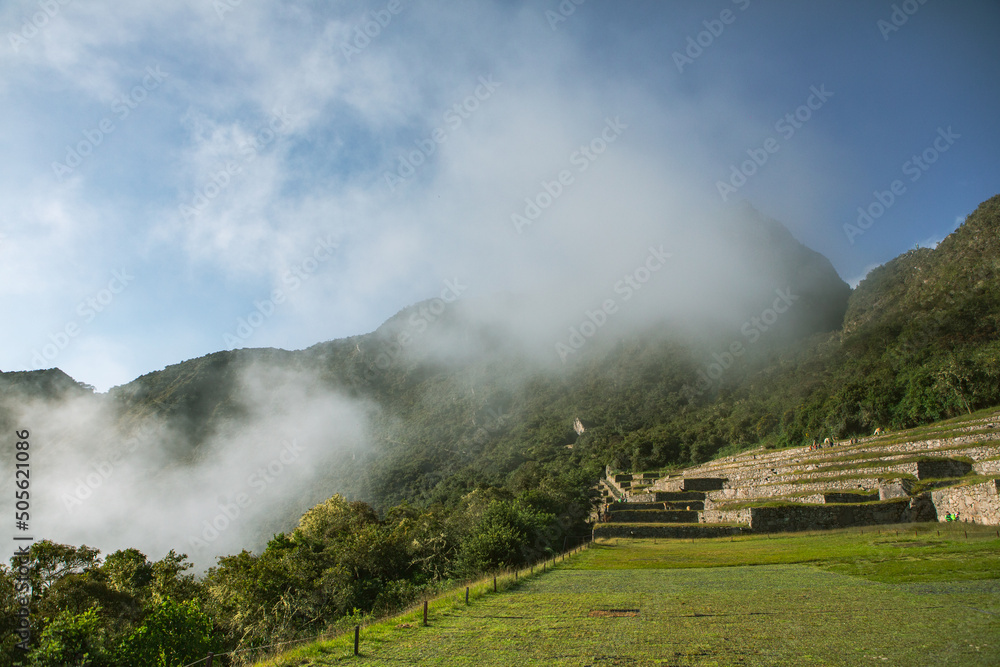 Wonder of the World Machu Picchu in Peru. Beautiful landscape in Andes Mountains with Incan sacred city ruins. 