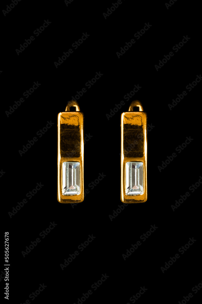 Gold earrings on black Gold earrings on black