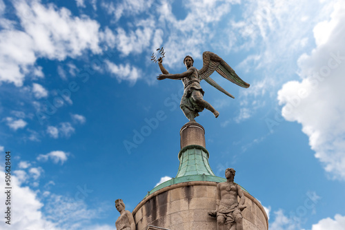 Padua downtown (Padova), Detail of Moroni Palace (Palazzo Moroni), town hall, bronze statue of the winged victory, Veneto, Italy, Europe. photo