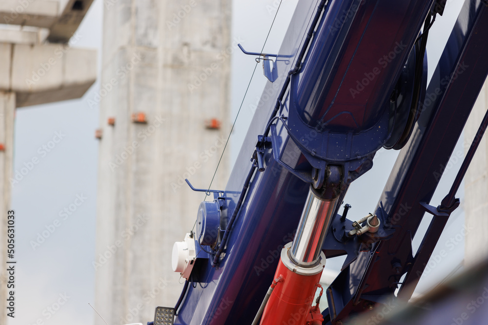 hydraulic cylinder of crane in construction site. hydraulic system. hydraulic cylinder of crane in construction site. hydraulic system.
