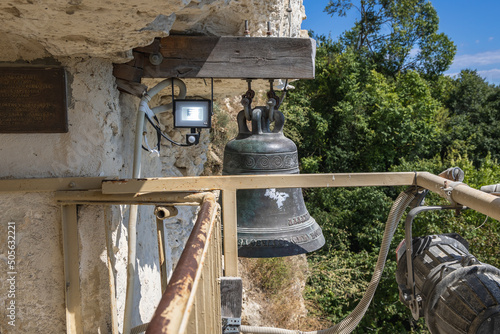 Bell in Aladzha Orthodox Monastery in Golden Sands Nature Park, Bulgaria photo