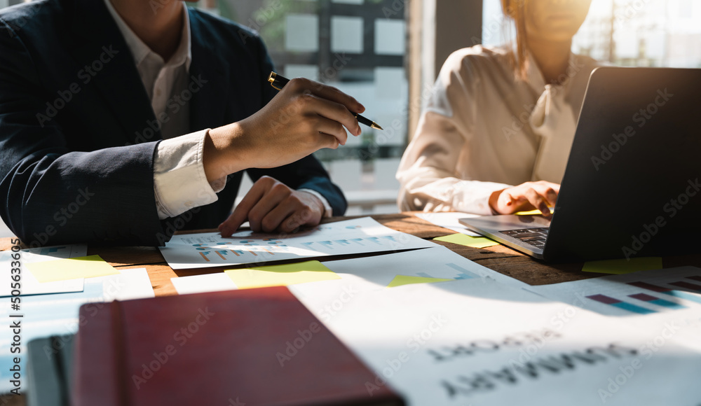 Group of business people are meeting to analyze data for marketing plan at meeting room Group of business people are meeting to analyze data for marketing plan at meeting room