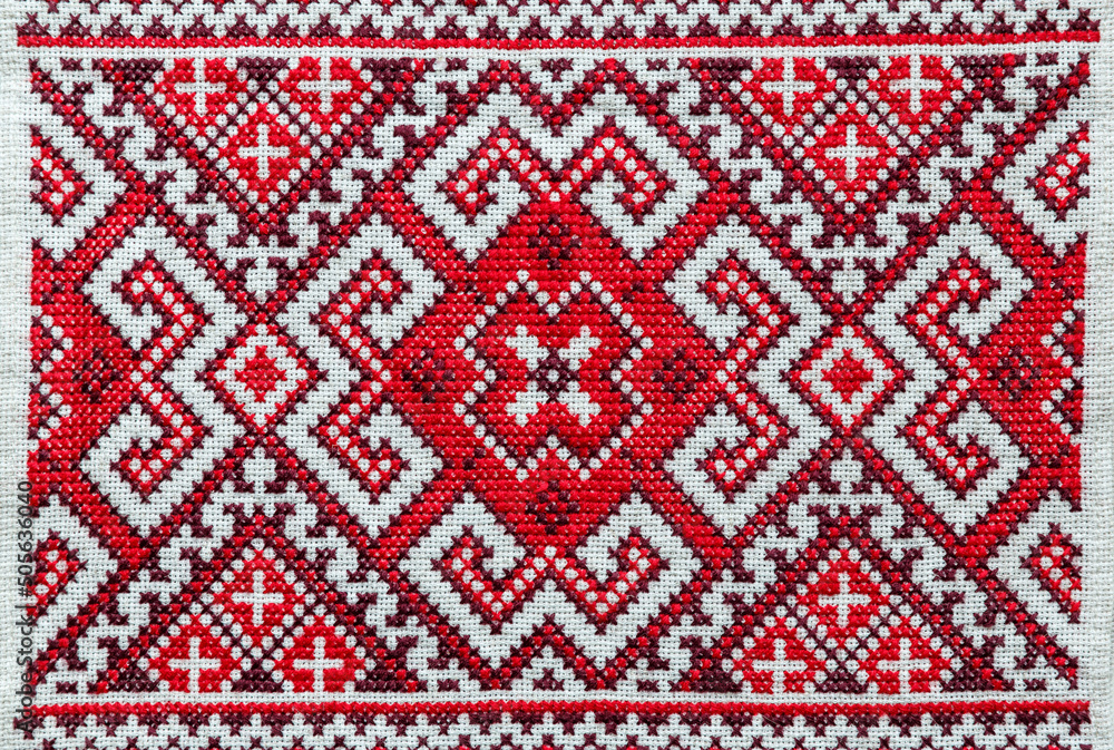 Traditional ukrainian embroidery on ukrainian rushnyk, made of linen cloth.