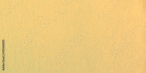 Abstract background with yellow color paper pattern, abstract background cardboard texture. Empty simple surface. Gold rough metal background and texture. for inscription sale wallpaper decoration 