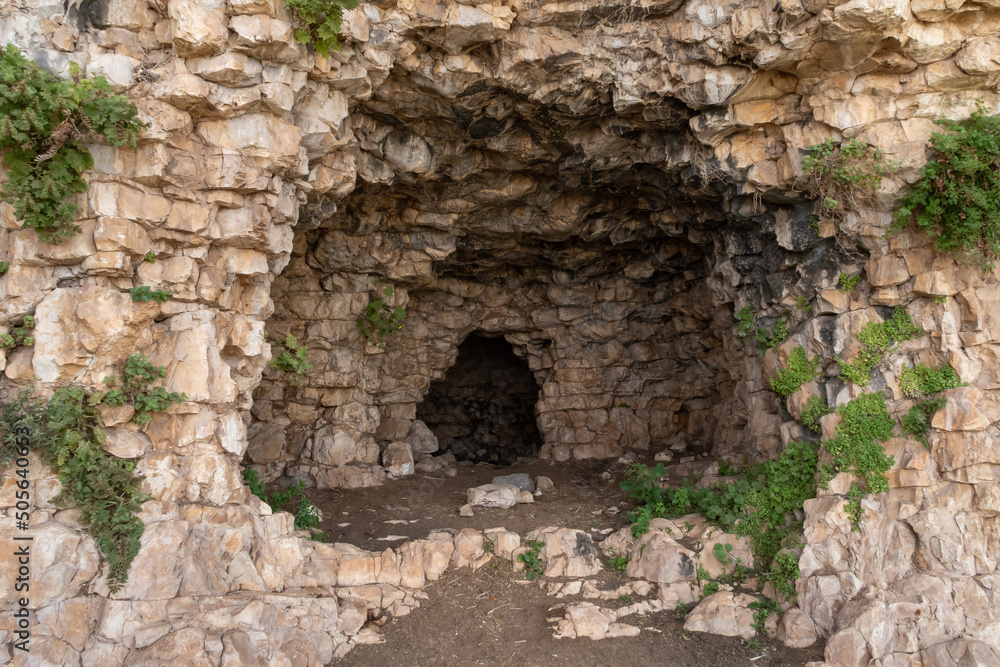 The remains  of the buildings of the ancient settlement on Mount Arbel, located on the coast of Lake Kinneret - the Sea of Galilee, near the city of Tiberias, in northern Israel