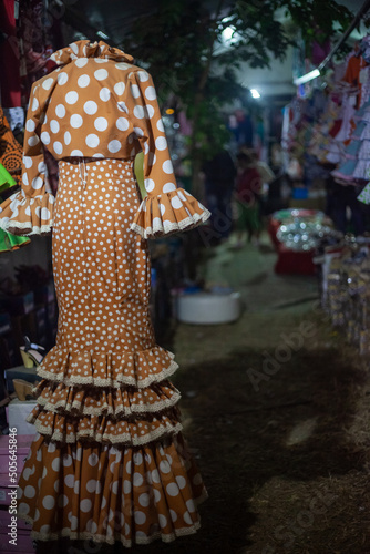 typical spanish dress with polka dots on a mannequin photo