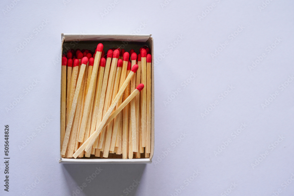Close up of matches on white background Close up of matches on white background
