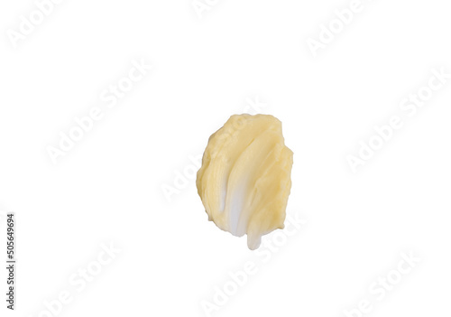 Obraz na płótnie Cosmetic products creamy yellow stain texture on a white background. The texture of natural cosmetics hair mask, cream, scrub w salonie