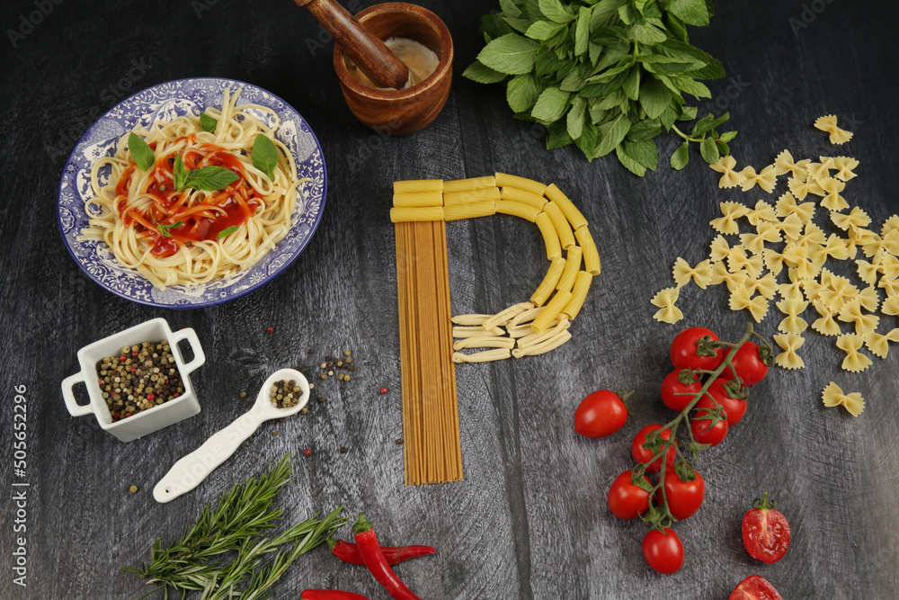 pasta and pepper mint ingredients around on black background pasta and pepper mint ingredients around on black background